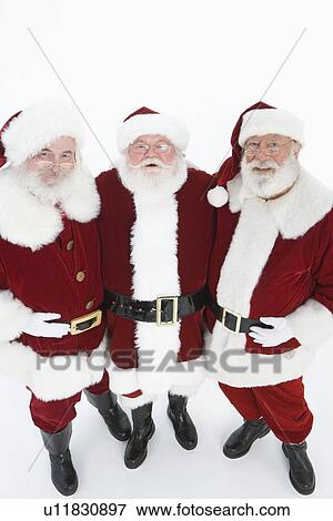 Stock Photo - Group of men dressed as Santa Claus, portrait. Fotosearch