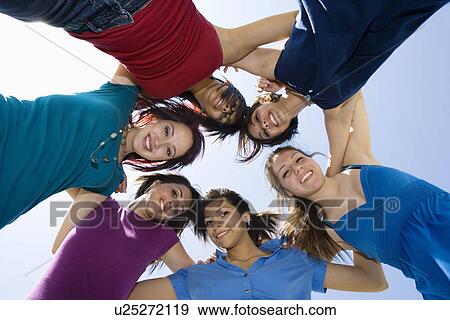 High School Friends Huddling View Large Photo Image Stock Photo - High School Friends Huddling. Fotosearch