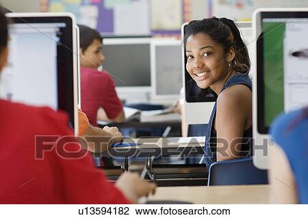 Stock Image - High School Student in Class. Fotosearch
