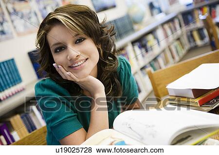 Stock Photo - High School Student in Library. Fotosearch