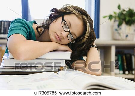 High School Student Sleeping on a Stack of Books View Large Photo Image Stock Photography - High School Student Sleeping on a Stack of Books. Fotosearch