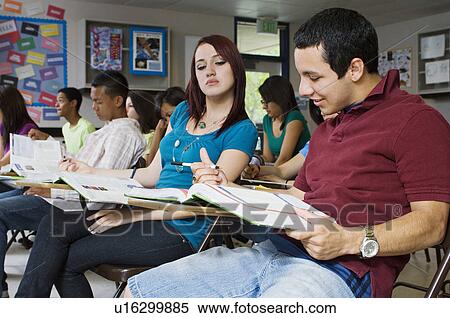 High School Student Trying to Read Neighbor's Answers View Large Photo Image Stock Photography - High School Student Trying to Read Neighbor's Answers. Fotosearch