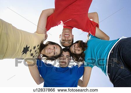 High School Students Huddling View Large Photo Image Stock Photograph - High School Students Huddling. Fotosearch