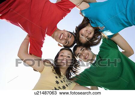 Stock Image - High School Students in a Huddle. Fotosearch