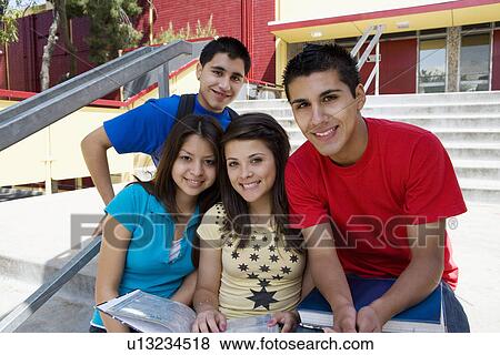 Stock Photo - High School Students on Steps of School. Fotosearch