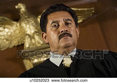 Stock Image - Judge in court, portrait. Fotosearch
