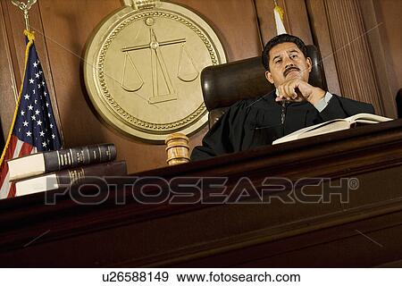 Stock Photo - Judge sitting in court. Fotosearch