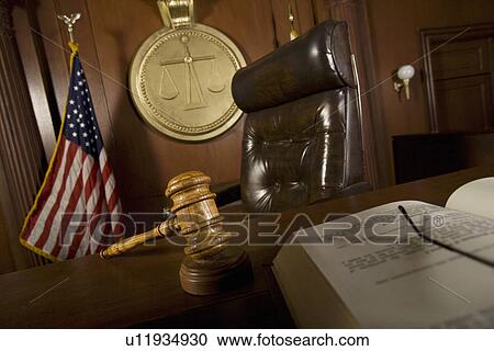 Stock Image - Judges chair in court room. Fotosearch