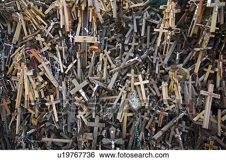 Stock Photograph - Lithuanian graveyard with wooden crosses. Fotosearch