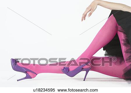 Low section of pink tights and purple high heeled shoes View Large Photo Image Stock Photography - Low section of pink tights and purple high heeled shoes. Fotosearch