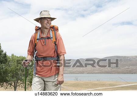 Mature man, orienteering View Large Photo Image Stock Image - Mature man, orienteering. Fotosearch