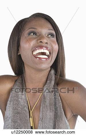 Stock Photo - Model in grey halter laughing. Fotosearch