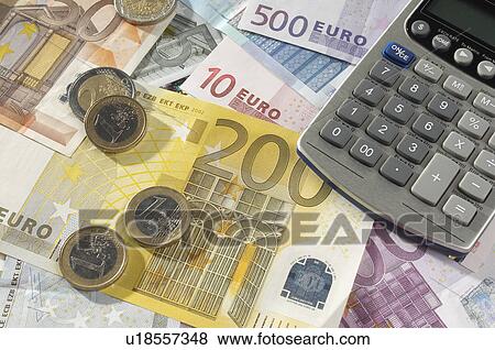 Stock Photo - Money and Calculator. Fotosearch