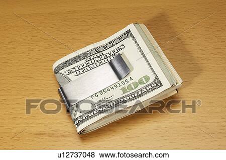 Stock Photo - Money in Money Clip. Fotosearch