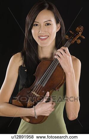 Portrait of female Asian violinist View Large Photo Image Stock Photo - Portrait of female Asian violinist. Fotosearch