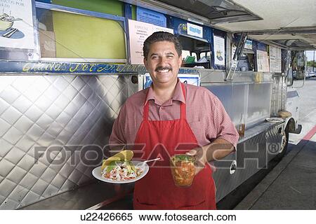 Portrait of man outside mobile cafe View Large Photo Image Stock Photography - Portrait of man outside mobile cafe. Fotosearch
