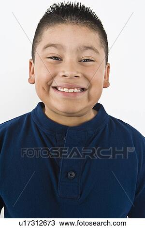Stock Image - Portrait of pre-teen (10-12) boy. Fotosearch