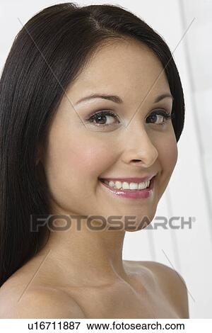 Stock Photo - Portrait of young woman. Fotosearch