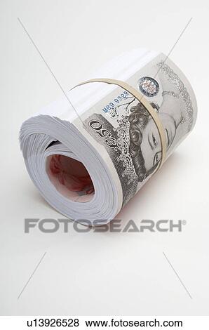 Roll of British paper currency View Large Photo Image Stock Photo - Roll of British paper currency. Fotosearch