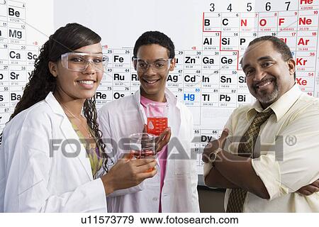 Stock Photo - Science Students with Beakers. Fotosearch