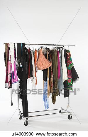 Stock Image - Selection of clothes on a rail. Fotosearch