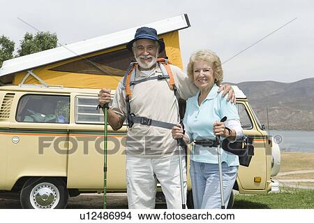 Picture - Senior couple and campervan. Fotosearch