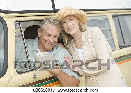 Senior couple with campervan View Large Photo Image Stock Photo - Senior couple with campervan. Fotosearch