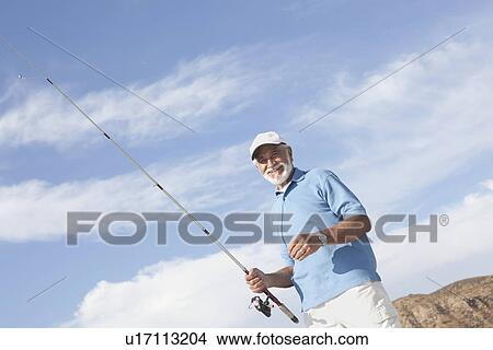 Senior man fishing View Large Photo Image Picture - Senior man fishing. Fotosearch