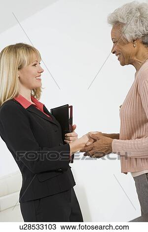 Senior Woman Meeting Financial Advisor View Large Photo Image Stock Image - Senior Woman Meeting Financial Advisor. Fotosearch
