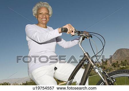 Senior woman on mountainbike View Large Photo Image Stock Photo - Senior woman on mountainbike. Fotosearch
