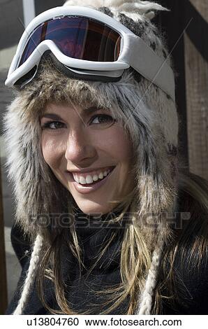 Skier Wearing Goggles and Fur Ski Hat View Large Photo Image Stock Image - Skier Wearing Goggles and Fur Ski Hat. Fotosearch