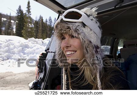 Skier Wearing Goggles and Fur Ski Hat View Large Photo Image Stock Photography - Skier Wearing Goggles and Fur Ski Hat. Fotosearch