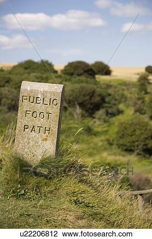 Stone sign marking footpath View Large Photo Image Stock Image - Stone sign marking footpath. Fotosearch