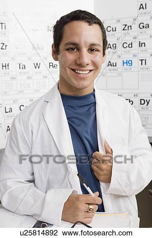 Stock Image - Student in Science Class. Fotosearch