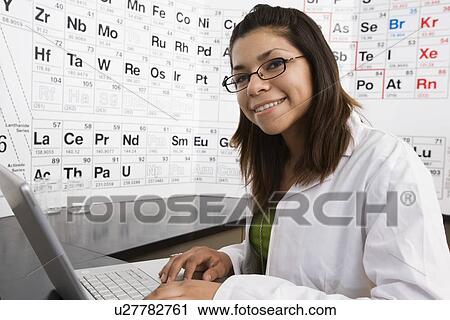 Stock Image - Student in Science Class with Laptop. Fotosearch