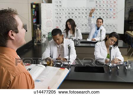 Student Raising Hand in Science Class View Large Photo Image Stock Photography - Student Raising Hand in Science Class. Fotosearch