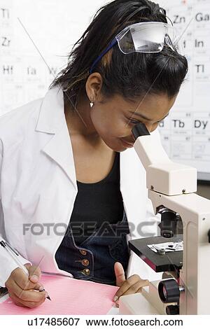 Student Using Microscope View Large Photo Image Stock Photo - Student Using Microscope. Fotosearch