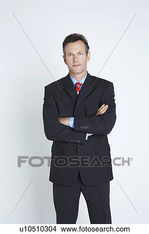 Studio portrait of businessman View Large Photo Image Picture - Studio portrait of businessman. Fotosearch