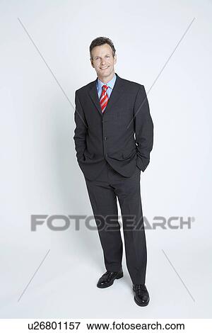 Stock Photo - Studio portrait of businessman. Fotosearch