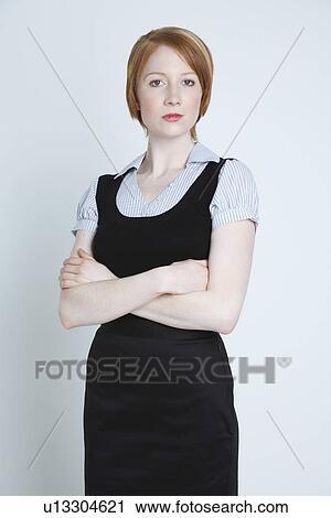 Stock Image - Studio shot of businesswoman. Fotosearch