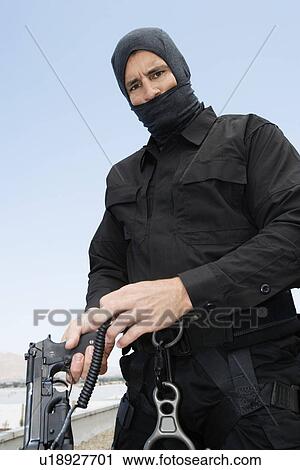 SWAT Team Officer with Automatic Pistol View Large Photo Image Stock Image - SWAT Team Officer with Automatic Pistol. Fotosearch