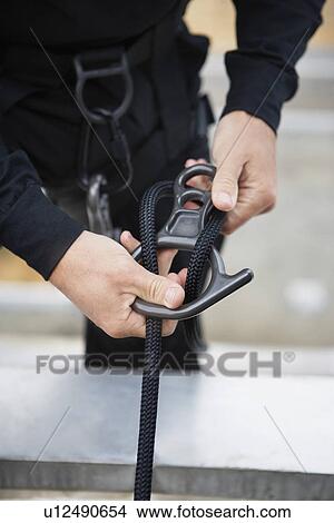 SWAT Team Preparing Climbing Equipment View Large Photo Image Picture - SWAT Team Preparing Climbing Equipment. Fotosearch