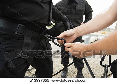 SWAT Team Preparing Climbing Equipment View Large Photo Image Stock Photography - SWAT Team Preparing Climbing Equipment. Fotosearch