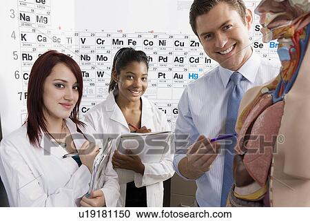 Stock Image - Teacher Giving Anatomy Lesson. Fotosearch