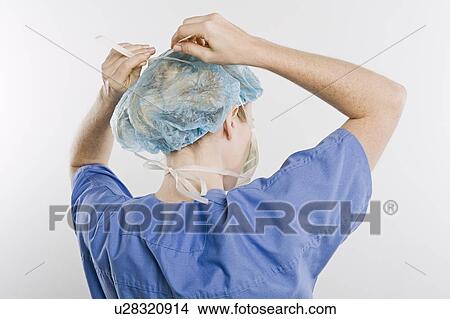 Picture - Threatre nurse, rear view. Fotosearch