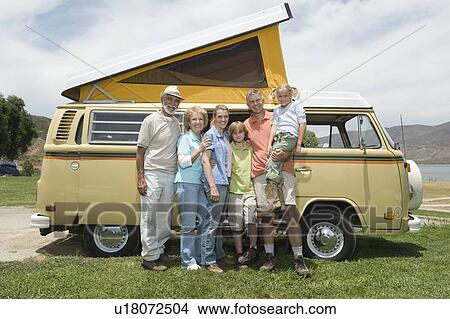 Picture - Three generational family with campervan. Fotosearch