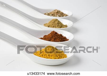Turmeric, chilli, cumin and chinese 5 spice View Large Photo Image Picture - Turmeric, chilli, cumin and chinese 5 spice. Fotosearch