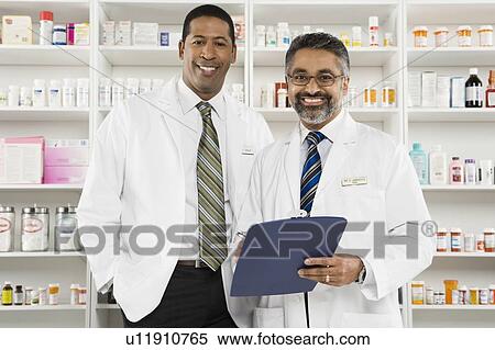Stock Photography - Two male pharmacists, portrait. Fotosearch