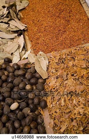 Stock Photo - UAE, Dubai, many different spices for sale at the spice souq in Deira. Fotosearch