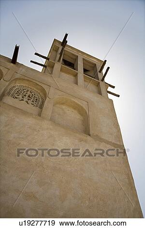 Stock Photo - UAE, Dubai, traditional windtower in the Bastakia Quarter of Bur Dubai. Fotosearch